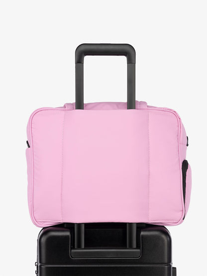 CALPAK Luka Weekender Duffel Bag with trolley sleeve for travel in pink; DSM1901-BUBBLEGUM