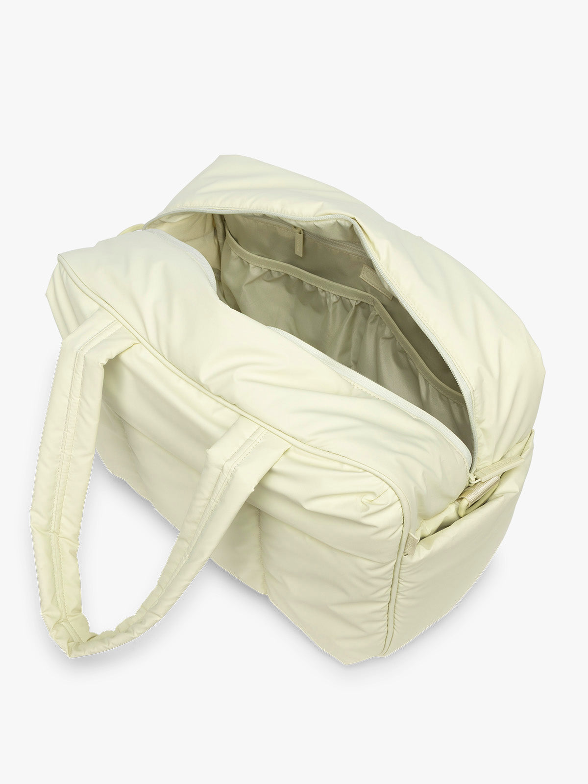 Opened CALPAK Luka Duffel in light green Celadon; DSM1901-CELADON