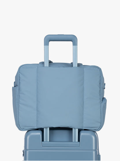 Luggage trolley sleeve of CALPAK Luka Duffel in light blue French Blue; DSM1901-FRENCH-BLUE