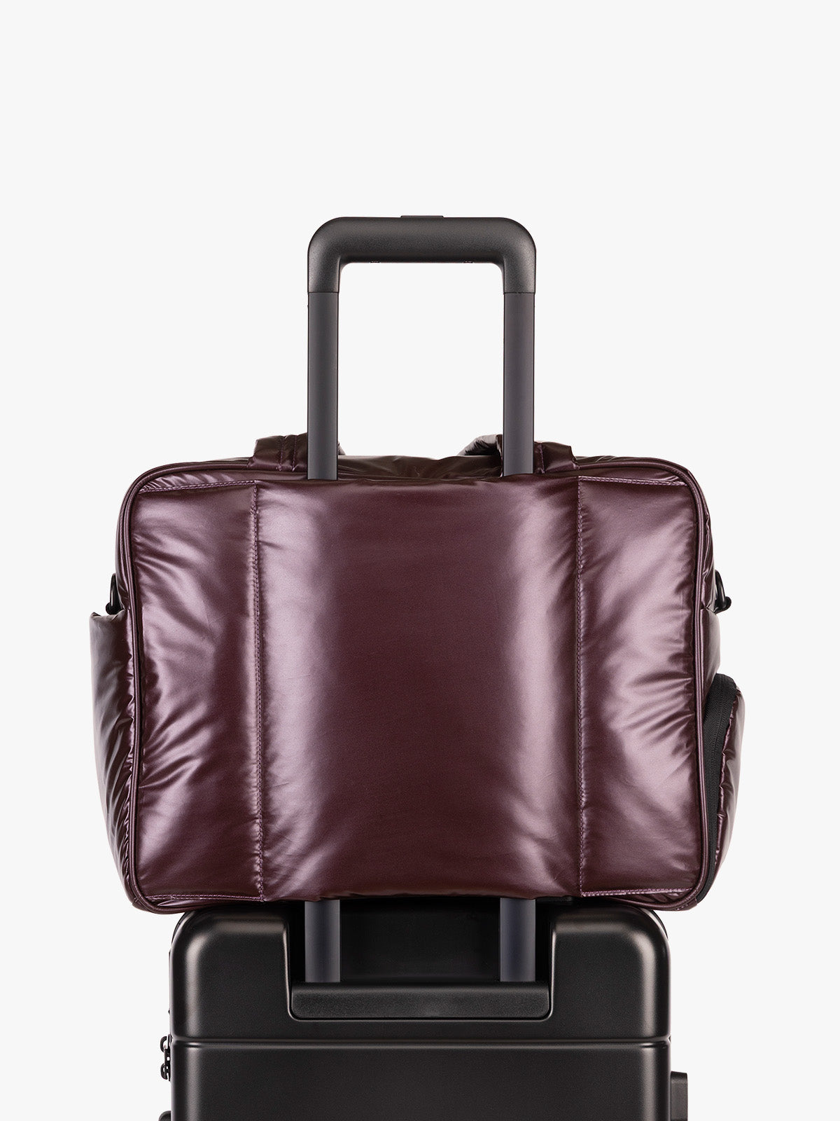 CALPAK Dark Cherry red Luka Duffel luggage trolley sleeve view on a white background; DSM1901-GLAZED-DARK-CHERRY