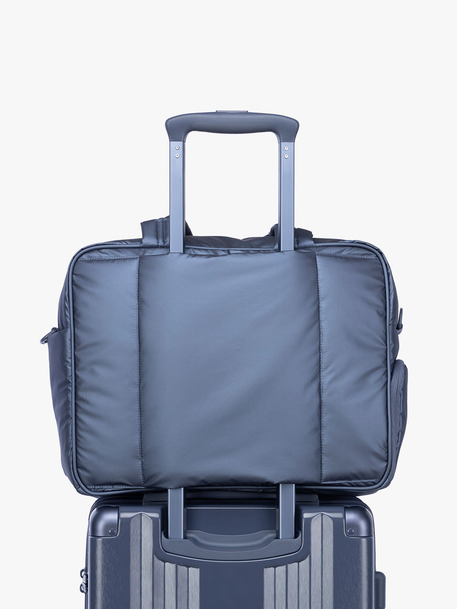 Luggage trolley sleeve of CALPAK Luka Duffel in metallic dark blue material Metallic Indigo; DSM1901-METALLIC-INDIGO