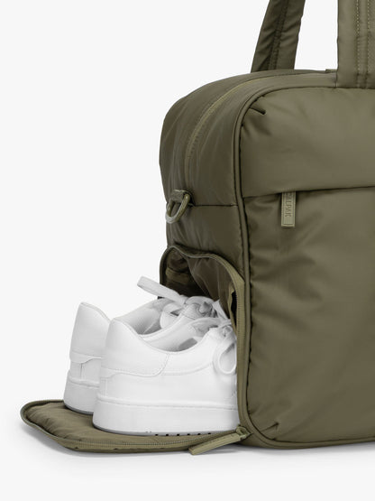 CALPAK Luka Duffel in dark green Pine shoe compartment; DSM1901-PINE
