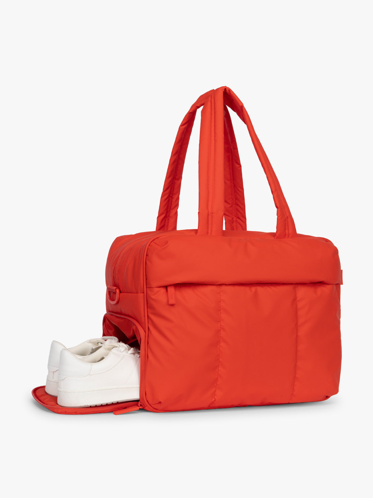 Shoe compartment of CALPAK Luka Duffel in red Tomato; DSM1901-TOMATO