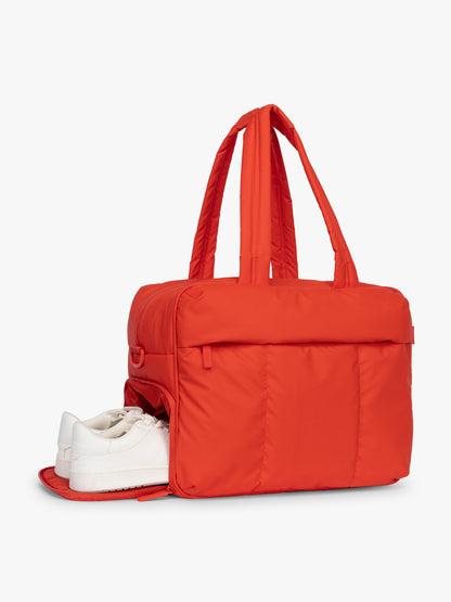 Shoe compartment of CALPAK Luka Duffel in red Tomato; DSM1901-TOMATO