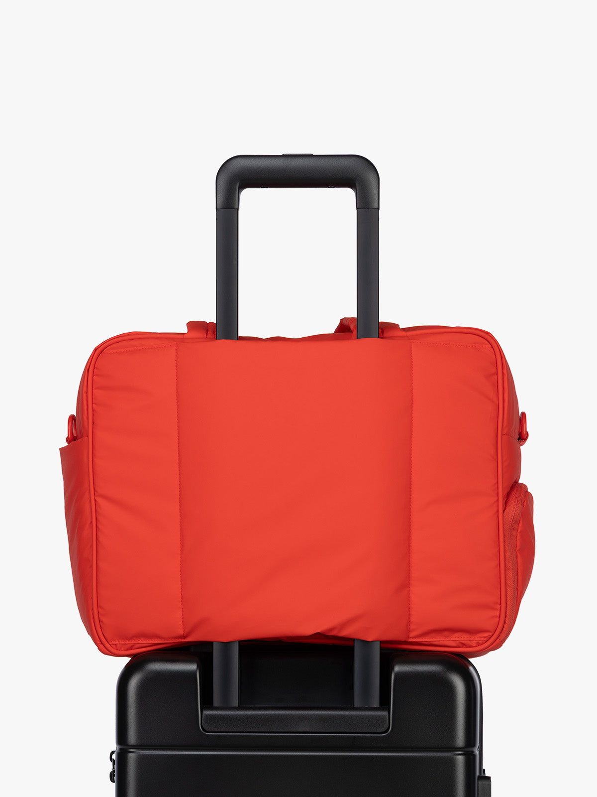 Luggage trolley sleeve of CALPAK Luka Duffel in red Tomato; DSM1901-TOMATO