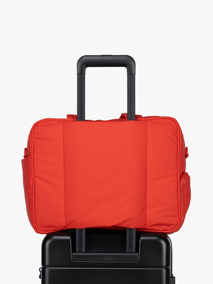 Luggage trolley sleeve of CALPAK Luka Duffel in red Tomato; DSM1901-TOMATO