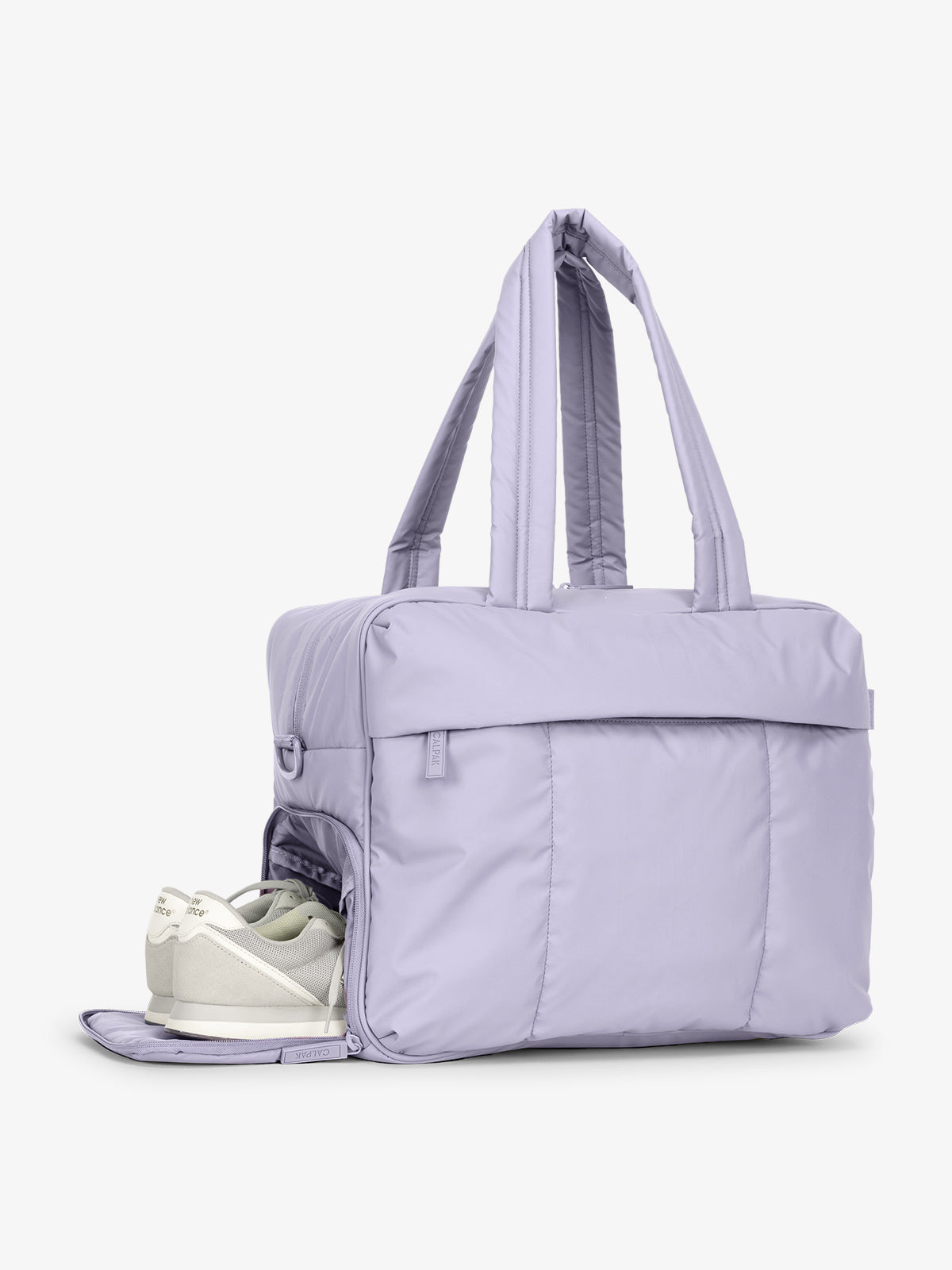 CALPAK Luka Duffel side shoe compartment shown in purple lavender Orchid; DSM1901-ORCHID