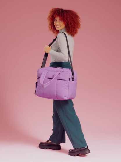 Model wearing Luka Duffel in lavender lilac over should with removable strap; DSM1901-LILAC