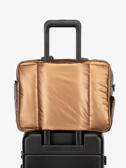 CALPAK Luka Duffel bag with luggage trolley sleeve in metallic copper; DSM1901-COPPER