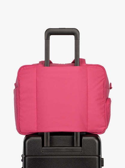 CALPAK Luka Duffel bag with luggage trolley sleeve in hot pink dragonfruit; DSM1901-DRAGONFRUIT
