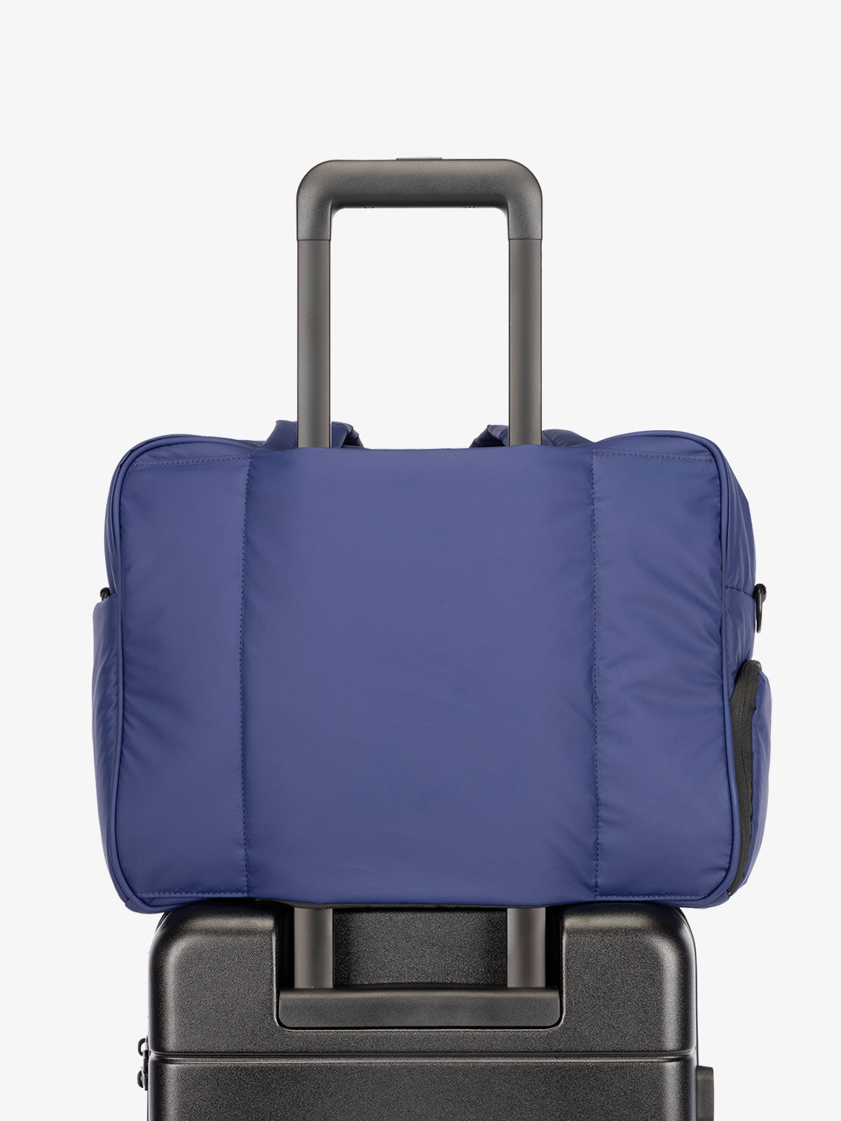 CALPAK Luka Duffel bag with luggage trolley sleeve in navy; DSM1901-NAVY