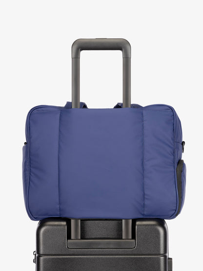 CALPAK Luka Duffel bag with luggage trolley sleeve in navy; DSM1901-NAVY