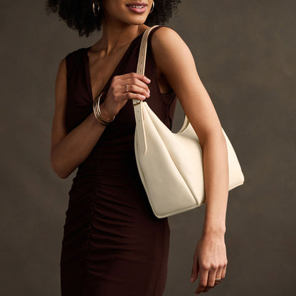Pebbled Bone*Medium | U-shaped, flat-bottomed leather shoulder bag with adjustable strap