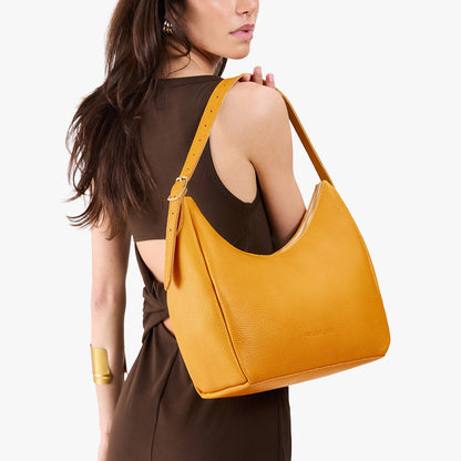 Sunshine*Medium | U-shaped, flat-bottomed leather shoulder bag with adjustable strap