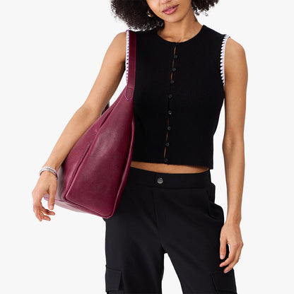 Orchid*Oversized | U-shaped, flat-bottomed leather shoulder bag with adjustable strap
